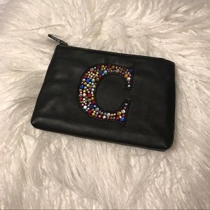 NWT’S Bloomingdales rhinestone “C” zip bag